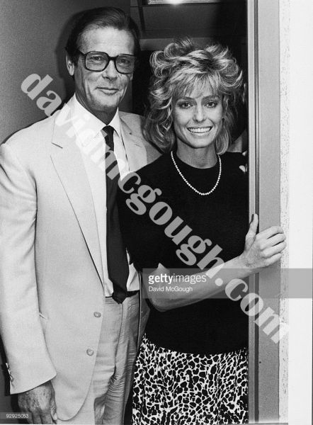 Roger Moore and Farrah Fawcett, NY 1984.jpg